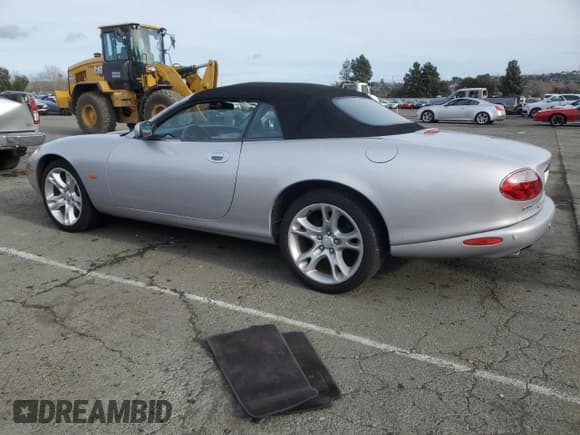 ✅ 2004 Jaguar XK • VIN: SAJDA42C442A37967 • Lot: 45768895. Listed on Copart with 124,130 mi. Free auction sales archive from the USA and detailed vehicle history report at DreamBid. Image 2.