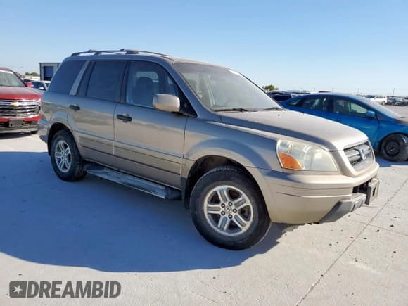 ✅ 2003 Honda Pilot EX • VIN: 2HKYF18473H575623 • Lot: 85359555. Wystawiony na Copart z przebiegiem 316 537 mil. Bezpłatny archiwum sprzedaży aukcyjnych z USA i szczegółowy raport historii pojazdu na DreamBid. Zdjęcie 4.