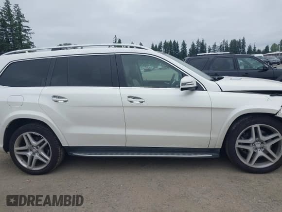 ✅ 2015 Mercedes-Benz GL 550 • VIN: 4JGDF7DEXFA510515 • Лот: 42464361. Опубликован ранее на IAAI с пробегом 100 252 миль. Бесплатный доступ к архиву аукционных продаж из США и подробный отчёт об истории автомобиля на DreamBid. Изображение 13.
