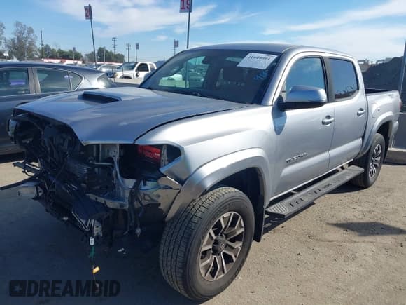 ✅ 2020 Toyota Tacoma SR5 • VIN: 3TMAZ5CN8LM126770 • Lot: 41644091. Listed on IAAI with 49,299 mi. Free auction sales archive from the USA and detailed vehicle history report at DreamBid. Image 2.