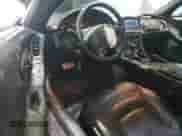 2004 Chevrolet Corvette z VIN 1G1YY22G645133638, wystawiony jako Copart lot #87247835 z przebiegiem 65 878 mil mil oraz Szkoda całkowita • Salvage title. Historia ofert i sprzedaży dostępna na DreamBid. Obrazek 8.