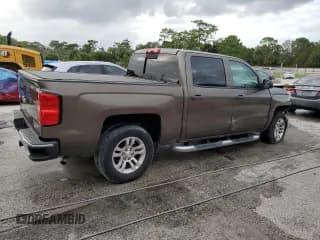 ✅ 2014 Chevrolet Silverado 1500 LT • VIN: 3GCPCREC3EG239266 • Лот: 75282994. Опубликован ранее на Copart с пробегом 99 821 миль. Бесплатный доступ к архиву аукционных продаж из США и подробный отчёт об истории автомобиля на DreamBid. Изображение 3.