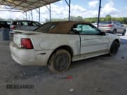 ✅ 2002 Ford Mustang Deluxe • VIN: 1FAFP44412F113486 • Lot: 69901725. Listed on Copart with 214,518 mi. Free auction sales archive from the USA and detailed vehicle history report at DreamBid. Image 3.