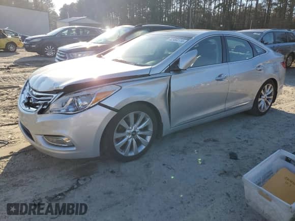 2012 Hyundai Azera с VIN KMHFH4JG3CA193325, выставлен на аукционе Copart как лот 82984174 с пробегом 129 408 миль миль и Списание • Salvage title. История ставок и продаж доступна на DreamBid. Изображение 1.