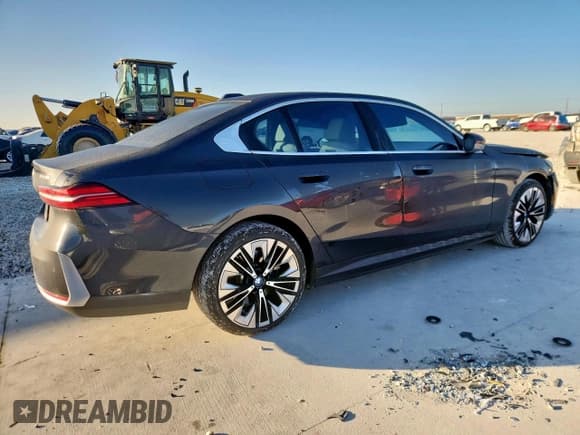 ✅ 2024 BMW i5 eDrive40 • VIN: WBY33FK05RCR49669 • Lot: 92306995. Listed on Copart with 16,444 mi. Free auction sales archive from the USA and detailed vehicle history report at DreamBid. Image 3.