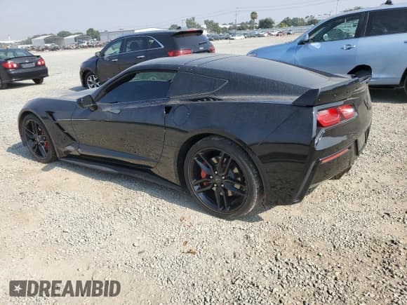 ✅ 2014 Chevrolet Corvette 3LT • VIN: 1G1YE2D76E5105135 • Lot: 67227065. Listed on Copart with 36,780 mi. Free auction sales archive from the USA and detailed vehicle history report at DreamBid. Image 2.