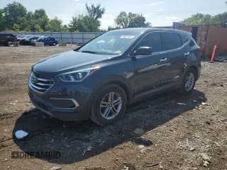 ✅ 2018 Hyundai Santa Fe 2.4L • VIN: 5NMZT3LB3JH052933 • Лот: 70067435. Опубликован ранее на Copart с пробегом 140 758 миль. Бесплатный доступ к архиву аукционных продаж из США и подробный отчёт об истории автомобиля на DreamBid. Изображение 1.