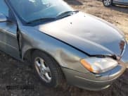 ✅ 2001 Ford Taurus SE • VIN: 1FAFP53U61G119347 • Lot: 43693455. Listed on IAAI with 150,165 mi. Free auction sales archive from the USA and detailed vehicle history report at DreamBid. Image 6.