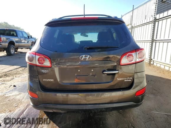✅ 2011 Hyundai Santa Fe Limited • VIN: 5XYZK4AG5BG077772 • Лот: 74562644. Опубликован ранее на Copart с пробегом 238 224 миль. Бесплатный доступ к архиву аукционных продаж из США и подробный отчёт об истории автомобиля на DreamBid. Изображение 6.
