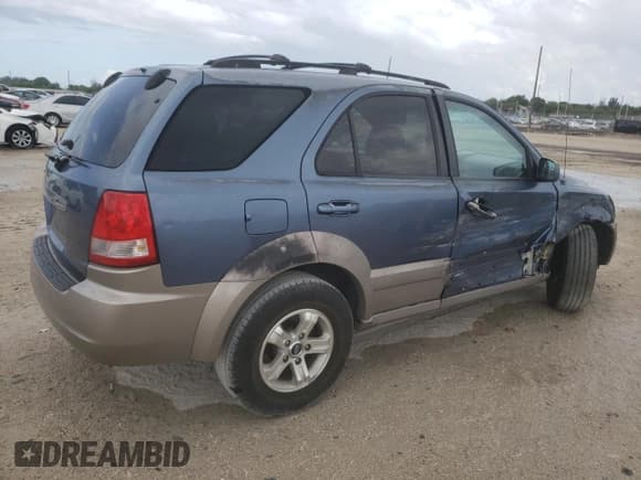 ✅ 2005 Kia Sorento LX • VIN: KNDJD733555429569 • Лот: 61785325. Опубликован ранее на Copart с пробегом 198 314 миль. Бесплатный доступ к архиву аукционных продаж из США и подробный отчёт об истории автомобиля на DreamBid. Изображение 3.