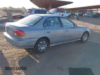 ✅ 1997 Honda Civic EX • VIN: 2HGEJ8647VH587457 • Lot: 43724439. Listed on IAAI with 216,814 mi. Free auction sales archive from the USA and detailed vehicle history report at DreamBid. Image 4.