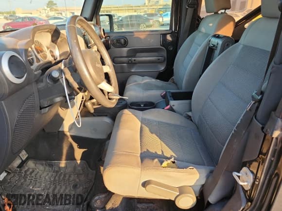 ✅ 2008 Jeep Wrangler Sahara • VIN: 1J8FA54158L589606 • Лот: 82117285. Опубликован ранее на Copart с пробегом 143 741 миль. Бесплатный доступ к архиву аукционных продаж из США и подробный отчёт об истории автомобиля на DreamBid. Изображение 7.