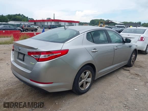 ✅ 2013 Kia Optima EX • VIN: KNAGM4AD7D5057586 • Lot: 42993608. Listed on IAAI with 112,078 mi. Free auction sales archive from the USA and detailed vehicle history report at DreamBid. Image 4.