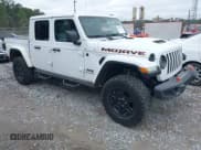 ✅ 2020 Jeep Gladiator Mojave • VIN: 1C6JJTEG7LL206581 • Lot: 41247922. Listed on IAAI with 27,876 mi. Free auction sales archive from the USA and detailed vehicle history report at DreamBid. Image 1.