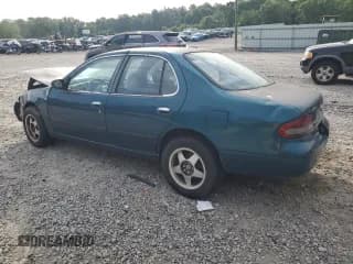 ✅ 1997 Nissan Altima XE • VIN: 1N4BU31D2VC138876 • Lot: 53892515. Listed on Copart with 155,286 mi. Free auction sales archive from the USA and detailed vehicle history report at DreamBid. Image 2.