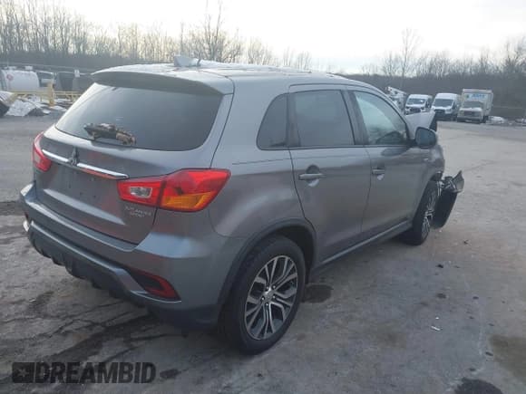 ✅ 2018 Mitsubishi Outlander ES • VIN: JA4AP3AU9JU024255 • Lot: 43906505. Listed on IAAI with 85,982 mi. Free auction sales archive from the USA and detailed vehicle history report at DreamBid. Image 4.