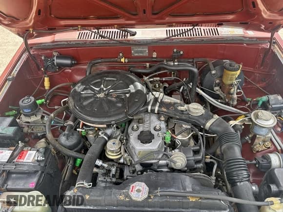 ✅ 1985 Toyota Pickup Deluxe • VIN: JT4RN56D9F5042940 • Lot: 62012505. Wystawiony na Copart z przebiegiem 178 298 mil. Bezpłatny archiwum sprzedaży aukcyjnych z USA i szczegółowy raport historii pojazdu na DreamBid. Zdjęcie 7.