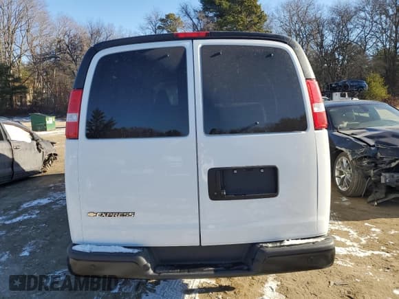✅ 2023 Chevrolet Express Passenger LS • VIN: 1GAZGNFP7P1234198 • Lot: 85733764. Listed on Copart with 18,464 mi. Free auction sales archive from the USA and detailed vehicle history report at DreamBid. Image 6.