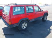 ✅ 1996 Jeep Cherokee Sport • VIN: 1J4FT68S0TL225719 • Lot: 42121351. Listed on IAAI with 237,602 mi. Free auction sales archive from the USA and detailed vehicle history report at DreamBid. Image 4.