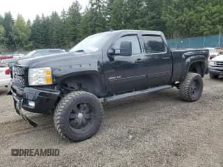 ✅ 2013 Chevrolet Silverado 3500HD High Country • VIN: 1GC4K1E89DF156508 • Лот: 66989154. Опубликован ранее на Copart с пробегом 207 980 миль. Бесплатный доступ к архиву аукционных продаж из США и подробный отчёт об истории автомобиля на DreamBid. Изображение 1.