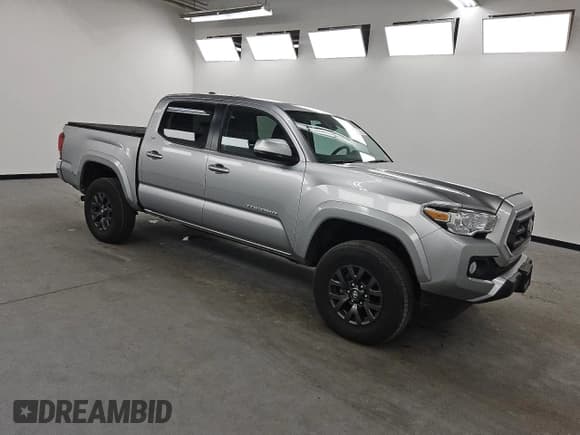 ✅ 2023 Toyota Tacoma SR5 • VIN: 3TYCZ5AN5PT129146 • Lot: 85304545. Listed on Copart with 16,074 mi. Free auction sales archive from the USA and detailed vehicle history report at DreamBid. Image 4.