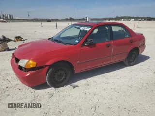 ✅ 1999 Mazda Protege DX • VIN: JM1BJ2225X0107748 • Lot: 48240945. Wystawiony na Copart z przebiegiem Nie podano. Bezpłatny archiwum sprzedaży aukcyjnych z USA i szczegółowy raport historii pojazdu na DreamBid. Zdjęcie 1.