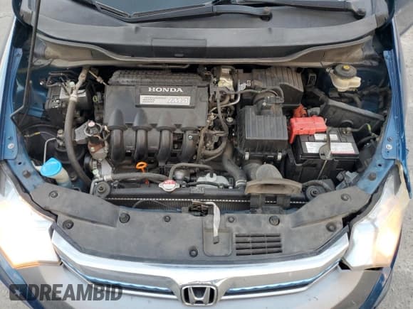 ✅ 2013 Honda Insight • VIN: JHMZE2H35DS000684 • Lot: 85436705. Listed on Copart with 187,528 mi. Free auction sales archive from the USA and detailed vehicle history report at DreamBid. Image 11.