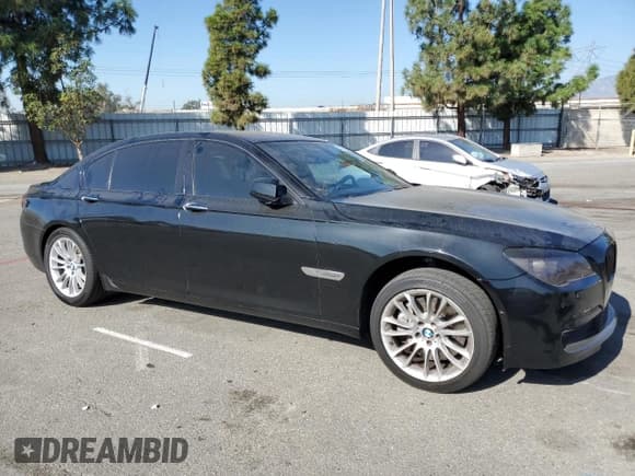 ✅ 2012 BMW 7 Series 750Li • VIN: WBAKB8C52CDX20760 • Lot: 91109405. Listed on Copart with 124,600 mi. Free auction sales archive from the USA and detailed vehicle history report at DreamBid. Image 4.
