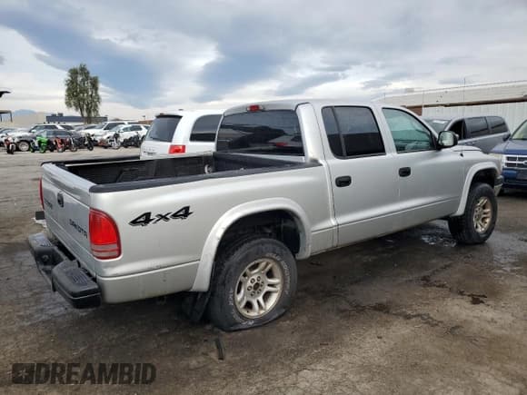 ✅ 2003 Dodge Dakota Sport • VIN: 1D7HG38N23S205026 • Lot: 50970345. Wystawiony na Copart z przebiegiem 194 724 mil. Bezpłatny archiwum sprzedaży aukcyjnych z USA i szczegółowy raport historii pojazdu na DreamBid. Zdjęcie 3.