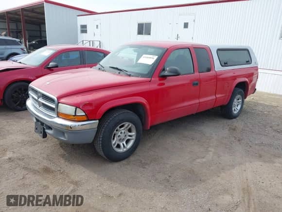 2003 Dodge Dakota SLT with VIN 1D7HL42X43S247404, listed as a IAAI auction lot 41685036 with 95,054 mi miles and . Bid and sale history available at DreamBid. Image 2.