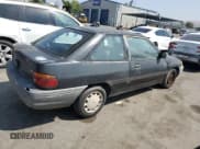 ✅ 1992 Ford Escort • VIN: 1FAPP11JXNW156984 • Лот: 63462264. Опубликован ранее на Copart с пробегом 37 774 миль. Бесплатный доступ к архиву аукционных продаж из США и подробный отчёт об истории автомобиля на DreamBid. Изображение 3.