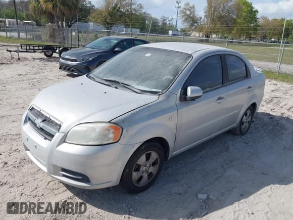 ✅ 2007 Chevrolet Aveo LS • VIN: KL1TD56687B084620 • Lot: 41719793. Wystawiony na IAAI z przebiegiem 119 233 mil. Bezpłatny archiwum sprzedaży aukcyjnych z USA i szczegółowy raport historii pojazdu na DreamBid. Zdjęcie 2.