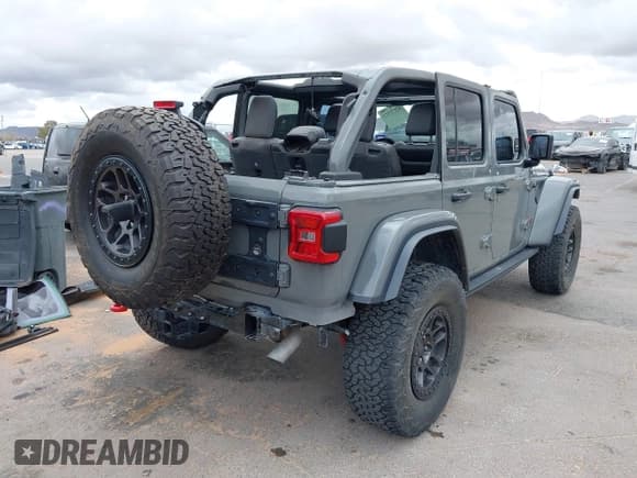 ✅ 2021 Jeep Wrangler Unlimited Rubicon • VIN: 1C4JJXFG8MW842795 • Lot: 42571315. Listed on IAAI with 31,004 mi. Free auction sales archive from the USA and detailed vehicle history report at DreamBid. Image 4.