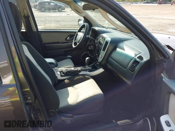 2006 Mercury Mariner Luxury с VIN 4M2YU56196KJ20438, выставлен на аукционе IAAI как лот 42394996 с пробегом 164 564 миль миль и . История ставок и продаж доступна на DreamBid. Изображение 5.