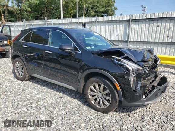 ✅ 2019 Cadillac XT4 AWD Premium Luxury • VIN: 1GYFZDR48KF117851 • Лот: 81936225. Опубликован ранее на Copart с пробегом 96 707 миль. Бесплатный доступ к архиву аукционных продаж из США и подробный отчёт об истории автомобиля на DreamBid. Изображение 4.