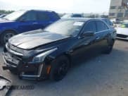 ✅ 2014 Cadillac CTS Vsport RWD • VIN: 1G6AU5S80E0157000 • Lot: 42421328. Listed on IAAI with 130,953 mi. Free auction sales archive from the USA and detailed vehicle history report at DreamBid. Image 2.