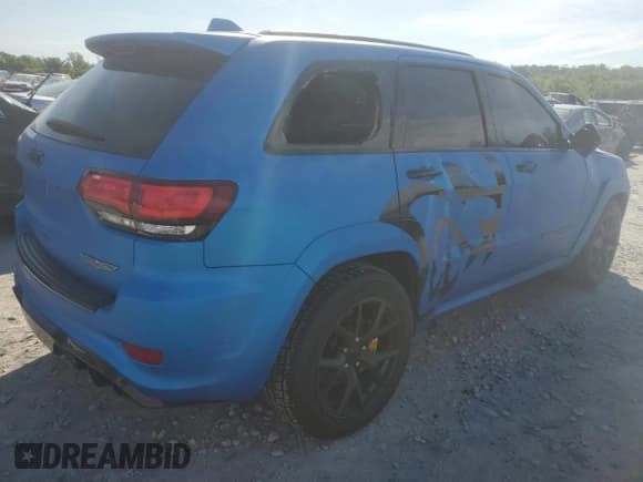 ✅ 2018 Jeep Grand Cherokee • VIN: NCS106058 • Lot: 58186895. Listed on Copart with 94,614 mi. Free auction sales archive from the USA and detailed vehicle history report at DreamBid. Image 3.