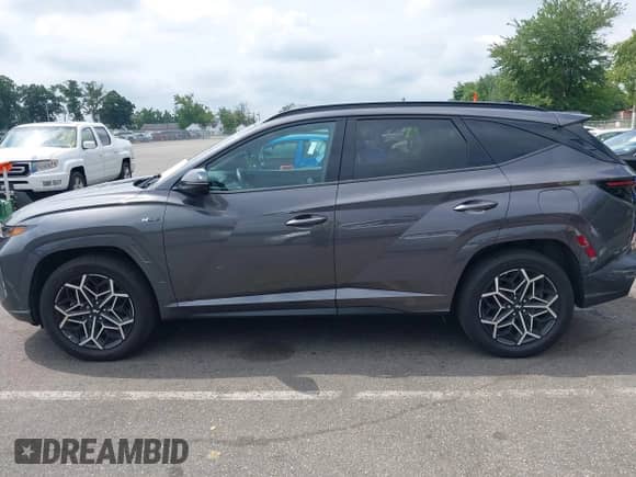 2024 Hyundai Tucson N Line z VIN KM8JFCD14RU146989, wystawiony jako IAAI lot #42953948 z przebiegiem 224 172 mil mil oraz . Historia ofert i sprzedaży dostępna na DreamBid. Obrazek 15.