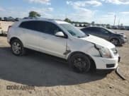 ✅ 2010 Cadillac SRX Luxury Collection • VIN: 3GYFNAEY1AS582078 • Lot: 87105905. Wystawiony na Copart z przebiegiem 128 304 mil. Bezpłatny archiwum sprzedaży aukcyjnych z USA i szczegółowy raport historii pojazdu na DreamBid. Zdjęcie 4.