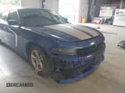 ✅ 2019 Dodge Charger SXT • VIN: 2C3CDXBG2KH709701 • Lot: 40395302. Listed on IAAI with 95,971 mi. Free auction sales archive from the USA and detailed vehicle history report at DreamBid. Image 21.