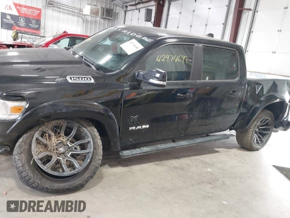 ✅ 2022 Ram 1500 Big Horn • VIN: 1C6SRFFT8NN128135 • Lot: 42974698. Listed on IAAI with 68,402 mi. Free auction sales archive from the USA and detailed vehicle history report at DreamBid. Image 13.