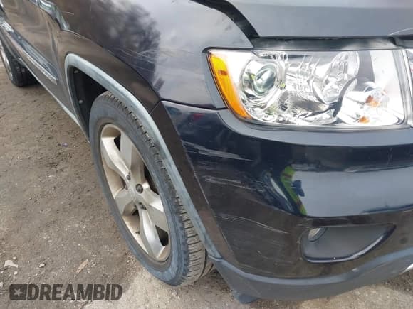 ✅ 2011 Jeep Grand Cherokee Overland Summit • VIN: 1J4RR6GT4BC535943 • Lot: 43764153. Listed on IAAI with 171,542 mi. Free auction sales archive from the USA and detailed vehicle history report at DreamBid. Image 6.