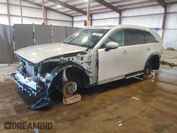 ✅ 2024 Mazda CX-90 Premium • VIN: JM3KKDHA8R1156549 • Лот: 64134745. Опубликован ранее на Copart с пробегом 15 161 миль. Бесплатный доступ к архиву аукционных продаж из США и подробный отчёт об истории автомобиля на DreamBid. Изображение 1.