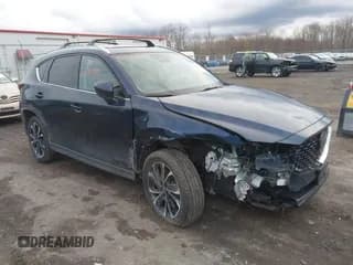 ✅ 2022 Mazda CX-5 S Premium Plus • VIN: JM3KFBEM5N0619772 • Lot: 43707259. Wystawiony na IAAI z przebiegiem 39 393 mil. Bezpłatny archiwum sprzedaży aukcyjnych z USA i szczegółowy raport historii pojazdu na DreamBid. Zdjęcie 1.
