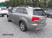 ✅ 2012 Kia Sorento SX • VIN: 5XYKWDA28CG281834 • Lot: 42596832. Listed on IAAI with 140,233 mi. Free auction sales archive from the USA and detailed vehicle history report at DreamBid. Image 3.