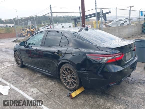 2023 Toyota Camry SE with VIN 4T1T11BK4PU080562, listed as a IAAI auction lot 42394695 with 37,299 mi miles and . Bid and sale history available at DreamBid. Image 3.