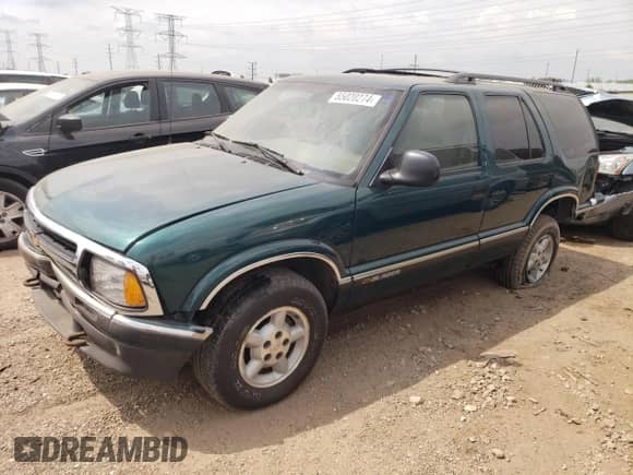 1997 Chevrolet Blazer LS с VIN 1GNDT13W9V2260978, выставлен на аукционе Copart как лот 55020274 с пробегом 125 005 миль миль и Списание • Salvage title. История ставок и продаж доступна на DreamBid. Изображение 1.