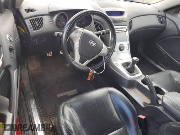 2010 Hyundai Genesis Coupe Track z VIN KMHHU6KHXAU025524, wystawiony jako Copart lot #52119665 z przebiegiem 134 693 mil mil oraz Szkoda całkowita • Salvage title. Historia ofert i sprzedaży dostępna na DreamBid. Obrazek 8.