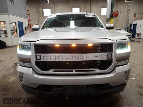 2018 Chevrolet Silverado 1500 LT с VIN 3GCUKRECXJG534137, выставлен на аукционе Copart как лот 78857174 с пробегом 87 590 миль миль и Списание • Salvage title. История ставок и продаж доступна на DreamBid. Изображение 5.