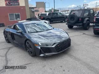 ✅ 2021 Audi R8 performance quattro • VIN: WUAKBAFX7M7900472 • Лот: 58422395. Опубликован ранее на Copart с пробегом 6 493 миль. Бесплатный доступ к архиву аукционных продаж из США и подробный отчёт об истории автомобиля на DreamBid. Изображение 1.